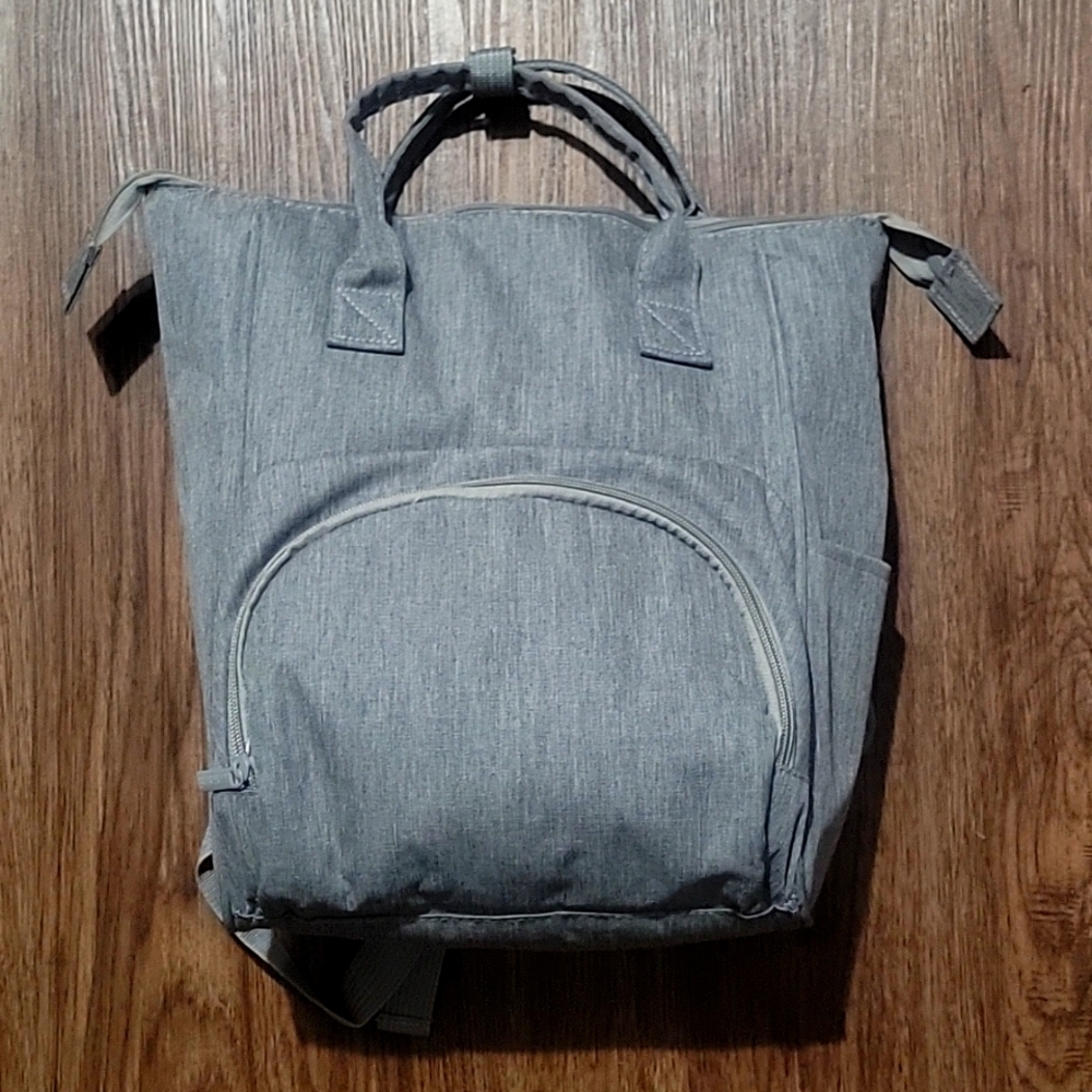 Enfamil Insulated milk storage backpack in gray.
